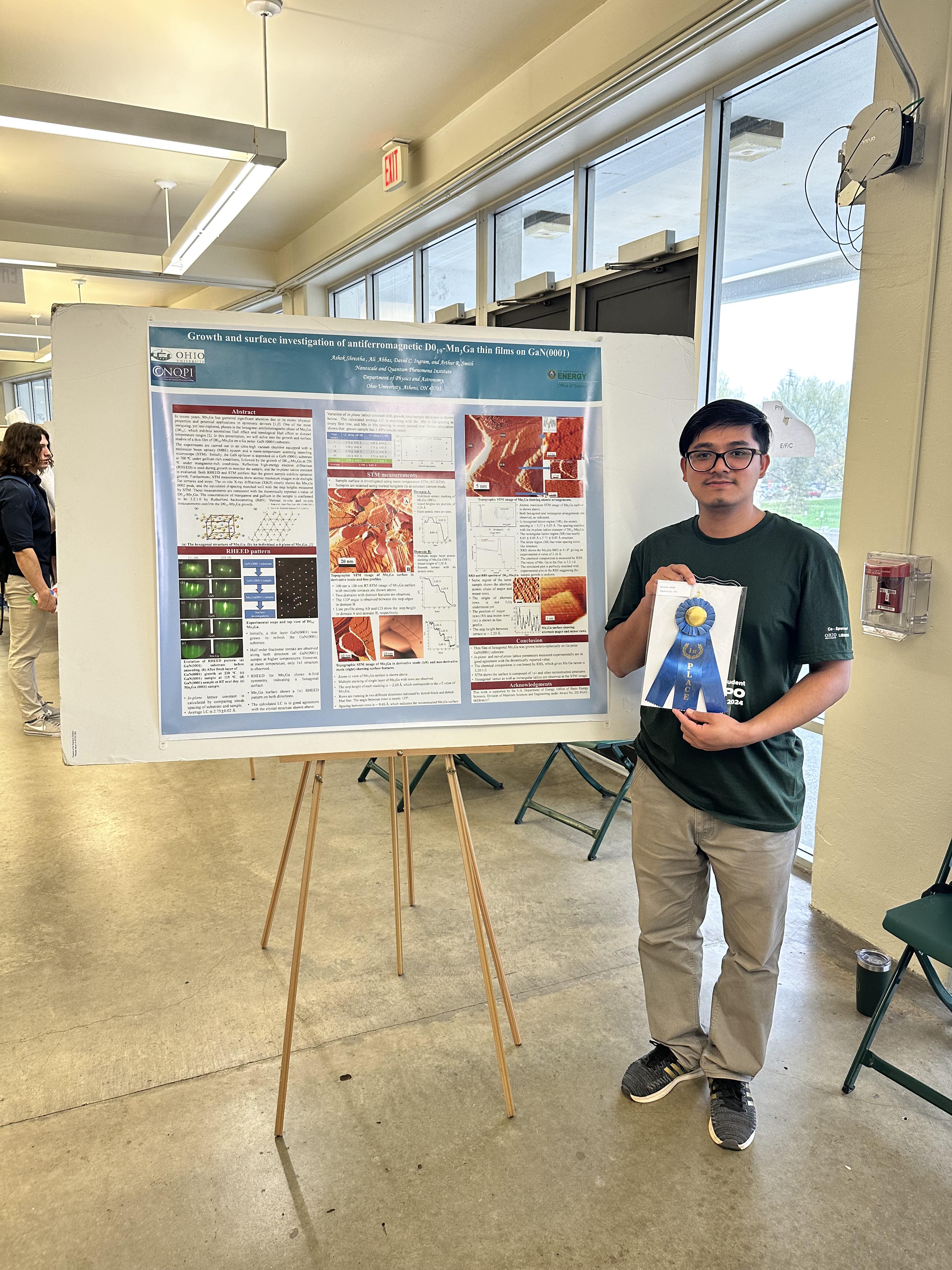 Ashok receives 1st place for his Ohio Student
                  Expo poster
